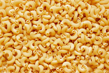 Italian pasta laid out on a white background. Background from pasta, isolate. Concept - food stocks during the covid-19 epidemic