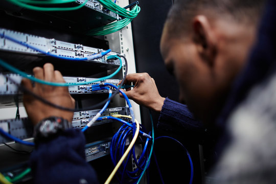 Service engineer working on a server
