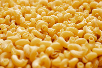 Italian pasta laid out on a white background. Background from pasta, isolate. Concept - food stocks during the covid-19 epidemic