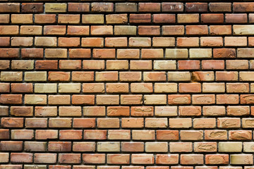 Obraz premium Old brick wall of a building, background, texture, pattern.