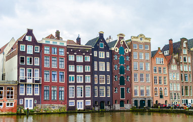 Obraz premium Water canals and buildings of Amsterdam.