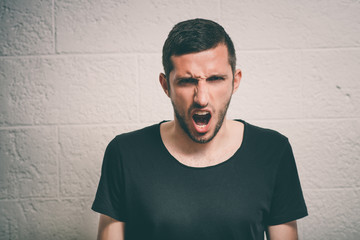Angry man screaming