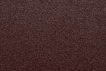 Elegant dark brown leatherette background. Dermantin texture. Copy space.