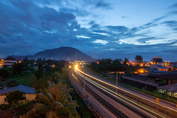 Light trail of KTM train in morning at Bukit Mertajam, Penang.