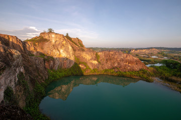 Fototapeta na wymiar A beautiful cliff near abandoned mining site Guar Petai in early morning.