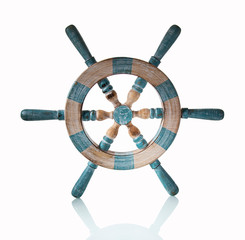 Obraz premium Wooden helm of a ship on a white background