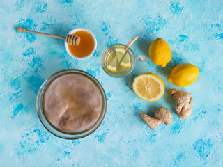 Kombucha fungus with ginger root, honey and lemon.