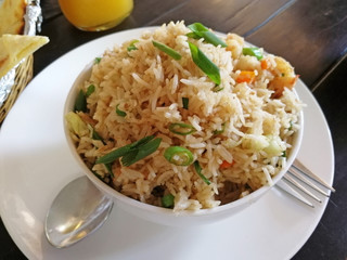 delicious rice with vegetables served in a Cup in an Indian cafe. healthy and delicious food