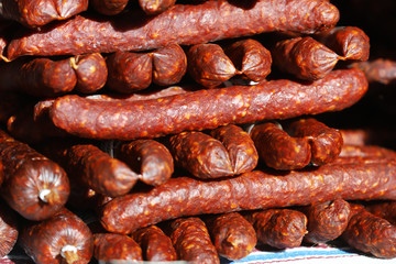 Traditional famous hungarian sausages arranged at the stand