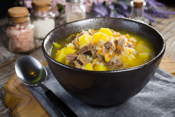 Polish barley soup with vegetables and chicken heart.