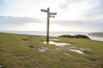 Signpost on top of a hill