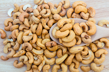 Tasty cashew nuts. The cashew tree is a tropical evergreen tree that produces the cashew seed and...