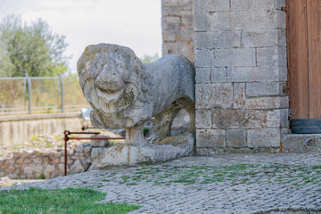 Fototapeta na wymiar Roman lion installed in Venosa about 2000 years ago in front of the church of the Holy Trinity
