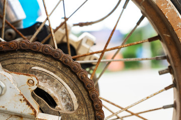 Old rusty motorcycle. typical vehicle in Asia. Parts and details of an old motorcycle