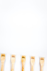 wooden kitchen utensils on white background top view mock up