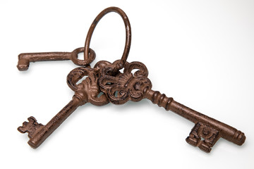 
Old keys on a white background