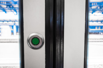 Button for opening doors in public transport