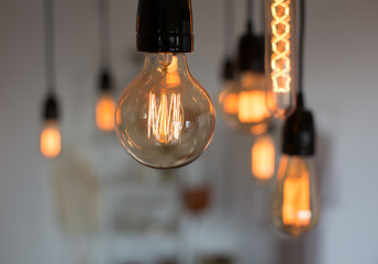 Set of vintage glowing light bulbs. Warm.