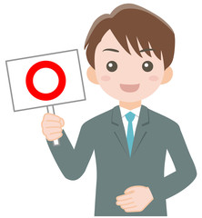 マルの札を持った男性