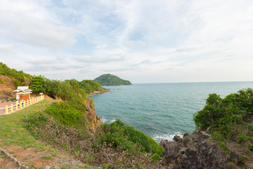 Fototapeta na wymiar Beautiful view point of tropical sea and island with mountain cliff and rocks in Noen Nangphaya View Point at Chalerm Burapha Chonlathit Highway, Chanthaburi, Thailand.