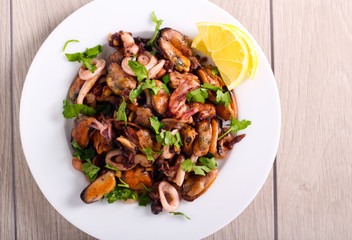 Seafood mix stir fry, served