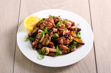 Seafood mix stir fry, served
