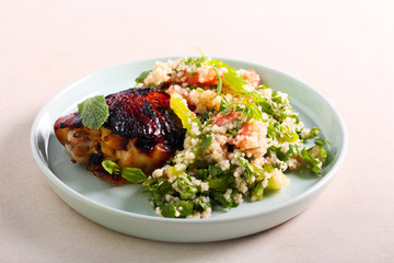 Salad and glazed chicken thigh