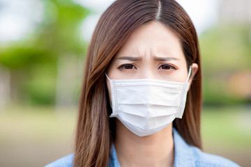 Asian woman with facial mask