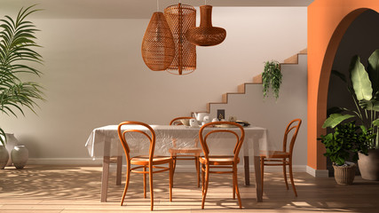 Vintage retro dining room with wooden table and chairs in orange tones, breakfast buffet, rattan...