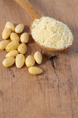 almond flour in a wooden spoon