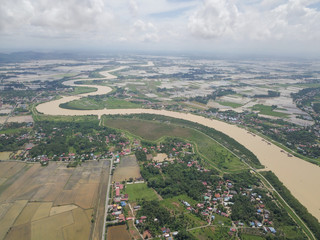 Aerial view Malays village house beside Sungai Muda.