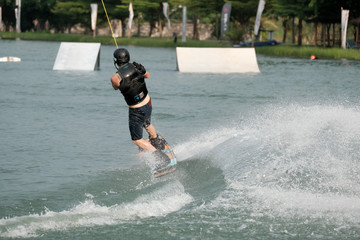 Young athlete Of Thailand is practicing sportWater Board at the wake park canal 6 on October 7, 2018.