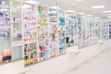 Foto op Canvas toonbank winkel tabel apotheek achtergrond plank wazig vervagen focus drug medische winkel drogisterij medicatie leeg geneeskunde farmacie. © davit85