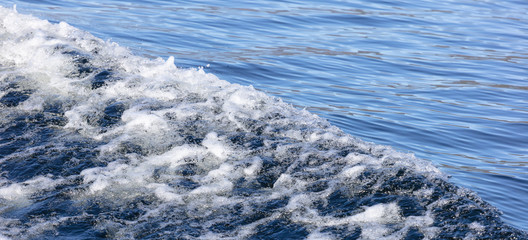 sculpted edges of the water. beautiful separation of water into a smooth surface and a storm. Blue Art. Water Banner. Ocean Texture. Waves Surface as Background & texture ripples lake