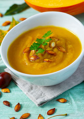 pumpkin soup on wooden surface