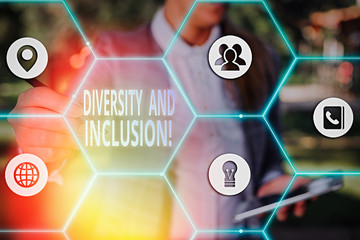 Writing note showing Diversity And Inclusion. Business concept for range difference includes race...