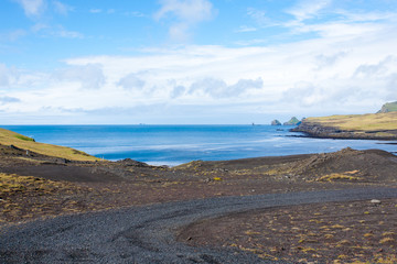 Vestmannaeyjar island beach day view, Iceland landscape.