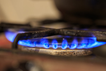 Old gas burner, blue gas flameOld gas burner, blue gas flame