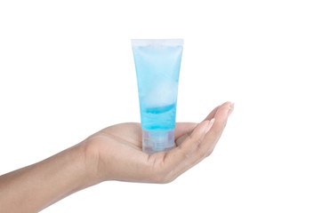 Woman hand using alcohol gel in plastic tube for washing hand, health care and medical concept