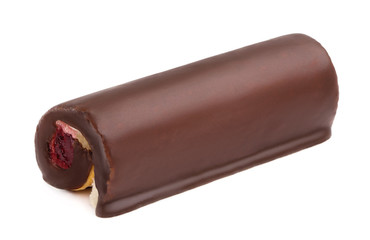 Chocolate cake roll with berry jam and butter cream isolated on white background