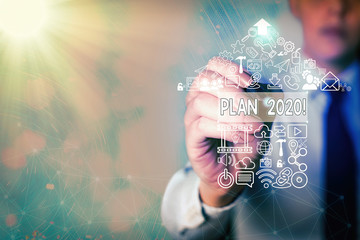 Writing note showing Plan 2020. Business concept for detailed proposal for doing or achieving...