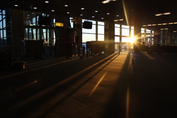 Waiting room in french airport with sun rays