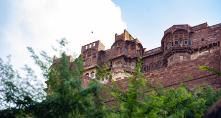 (Selective focus) Stunning view of the ancient Mehrangarh Fort during a beautiful sunny day. Jodhpur, Rajasthan, India. Mehrangarh (Mehran Fort) is one of the largest forts in India.