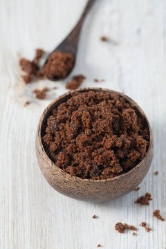 molasses sugar on wooden surface