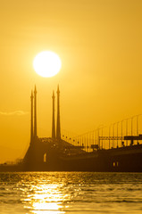 Gold sun rise at Penang Bridge.