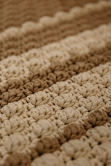 Knitted carpet or rug. Antique handmade carpet. Home hobby.