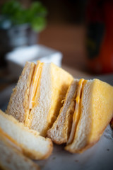 Delicious piece of sandwich ham cheese