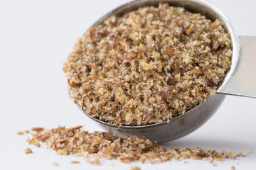 Flaxseed Meal Spilled from a Teaspoon