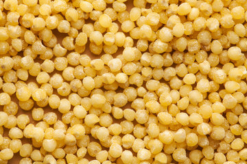 Millet close-up in full frame. Layout for grocery departments, packaging for millet producers. Food photo.