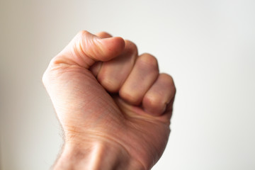fist isolated on a white background. show of strength.